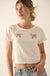 Ribbons and Bows Cropped Graphic Baby Tee - ShopPromesa