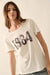 1984 Vintage-Print Varsity Graphic Tee - ShopPromesa