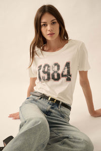 1984 Vintage-Print Varsity Graphic Tee - ShopPromesa