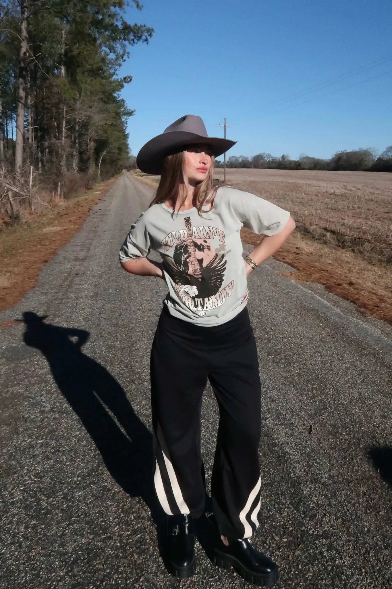 Wild Ain't For Tamin' Slashed Graphic Tee - ShopPromesa