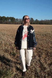 Wanted and Wild Distressed Graphic Tee - ShopPromesa