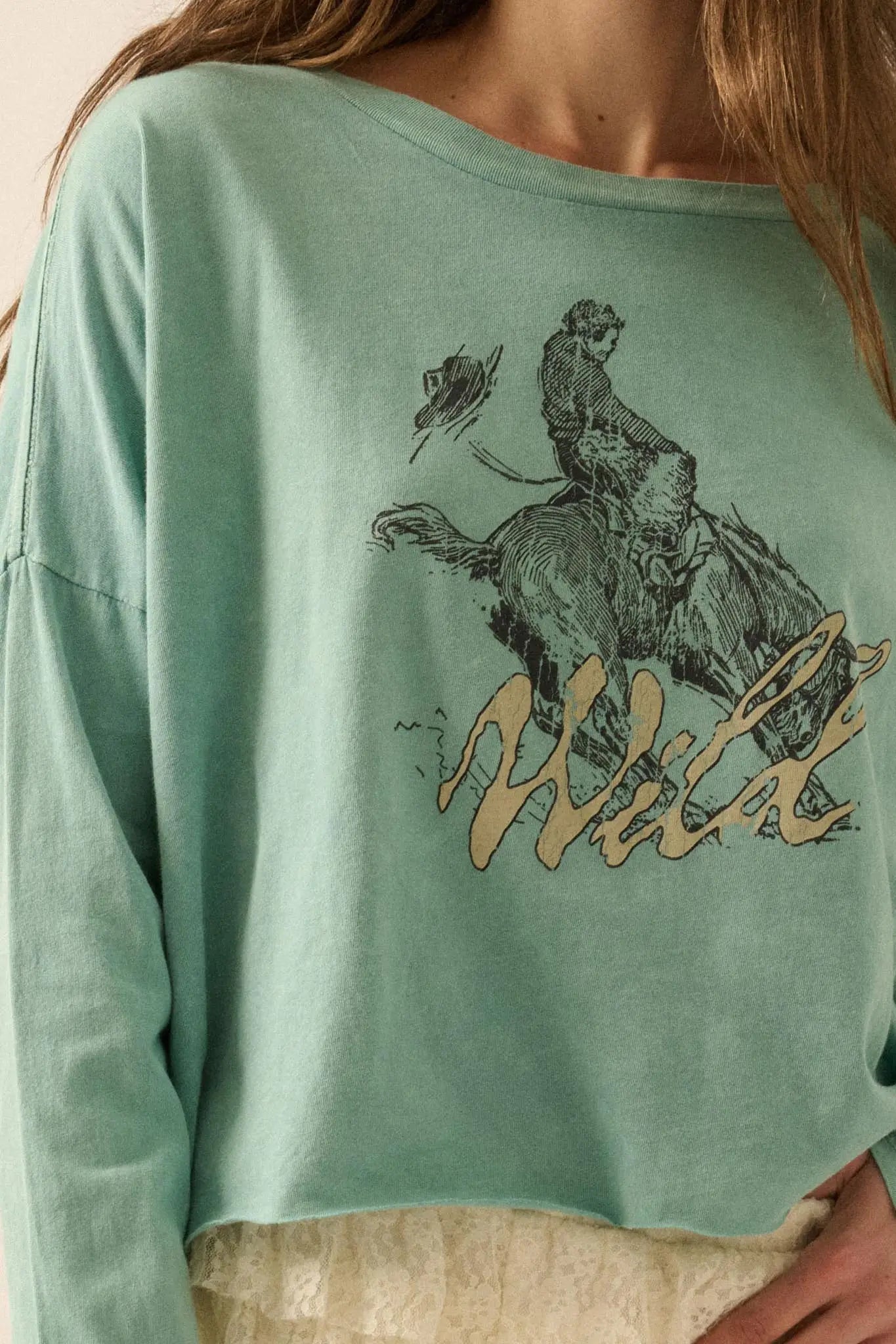Wild Bronco Cropped Long-Sleeve Graphic Tee | ShopPromesa Wild Bronco Cropped Long-Sleeve Graphic Tee | ShopPromesa