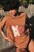 Bite the Apple Distressed Oversize Graphic Tee - ShopPromesa