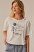 Océan Soleil Liberté Distressed Cropped Graphic Tee - ShopPromesa