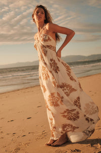 Golden Magnolia Floral Tie-Back Halter Maxi Dress - ShopPromesa
