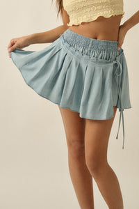 Blue Belle Smocked Denim Pleated Wrap Mini Skort - ShopPromesa