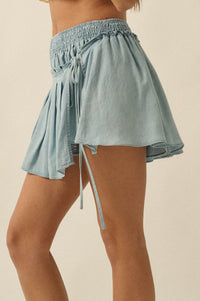 Blue Belle Smocked Denim Pleated Wrap Mini Skort - ShopPromesa