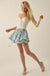 Dancing Daisies Floral Satin Drawstring Mini Skort - ShopPromesa