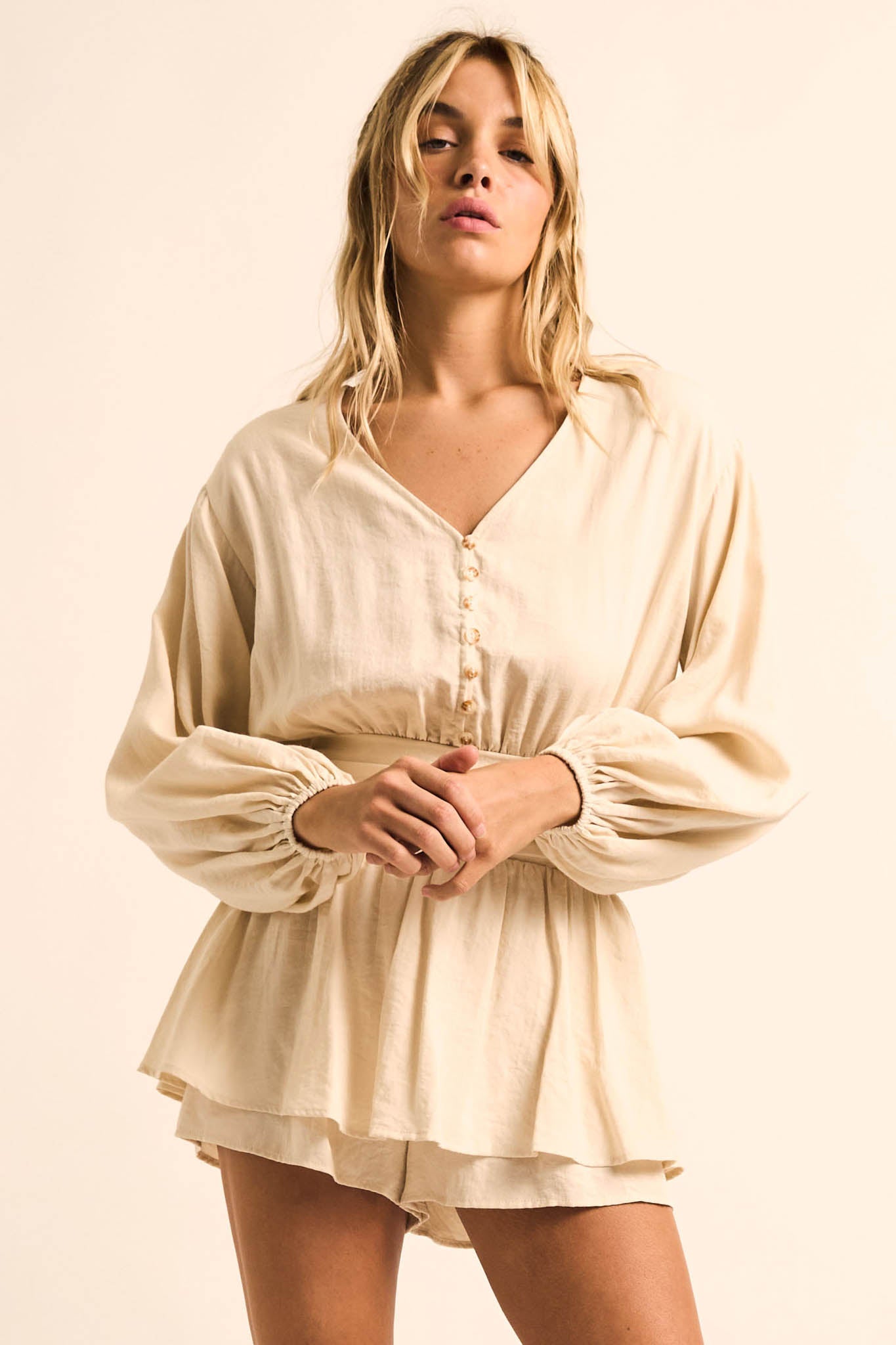 Sunday Stroll Button-Up Bubble-Sleeve Peplum Romper - ShopPromesa