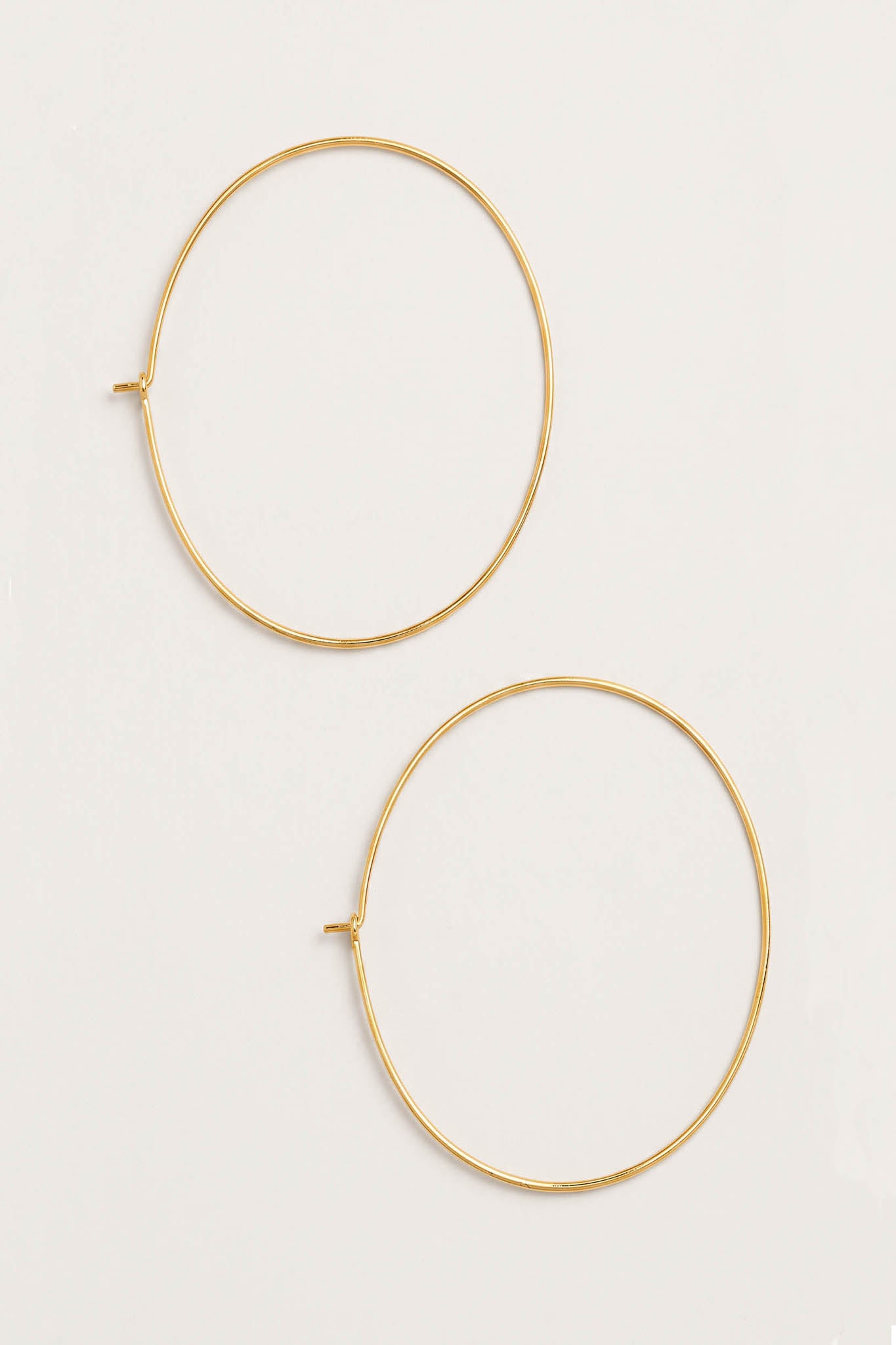 Highland Large Oval Gold-Tone Wire Hoop Earrings - ShopPromesa