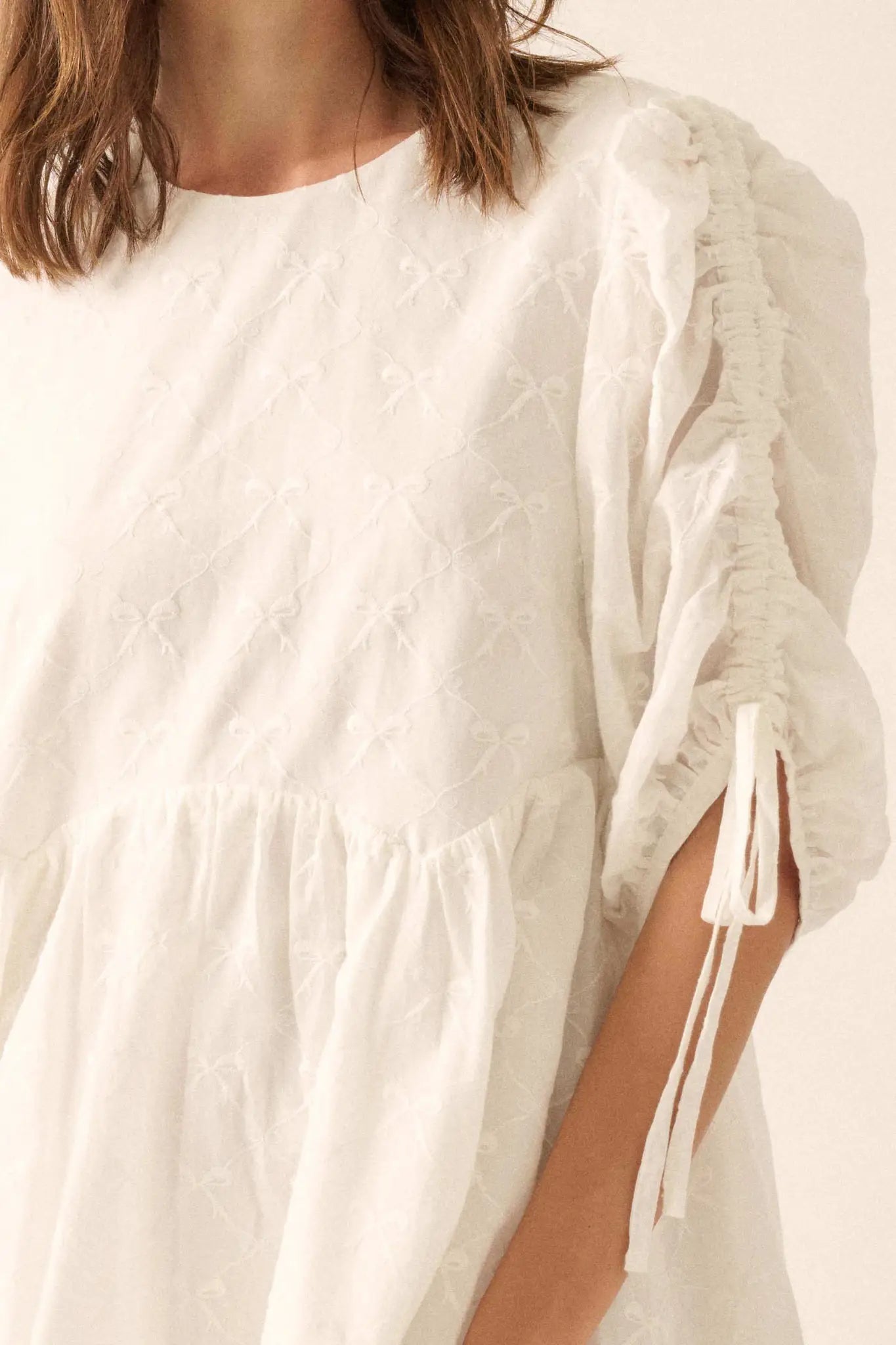 Angel Baby Bow-Embroidered Babydoll Mini Dress Off White / L Angel Baby Bow-Embroidered Babydoll Mini Dress Off White / L