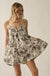Blossoming Blooms Floral Side-Tie Babydoll Romper - ShopPromesa