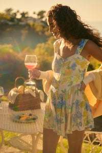 Beauty Within Floral Buttoned Tiered Ruffle Romper - ShopPromesa