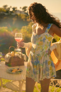 Beauty Within Floral Buttoned Tiered Ruffle Romper - ShopPromesa