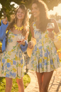 Beauty Within Floral Buttoned Tiered Ruffle Romper - ShopPromesa