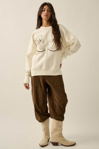 Head Over Boots Embroidered Exposed-Seam Sweater - ShopPromesa