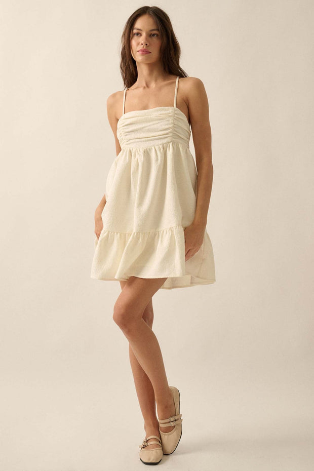 Soft Radiance Textured Floral Babydoll Mini Dress - ShopPromesa