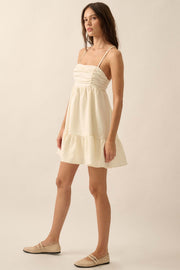 Soft Radiance Textured Floral Babydoll Mini Dress - ShopPromesa