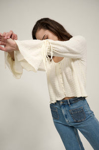 Pop Poetry Textured Button-Front Trumpet Blouse - ShopPromesa