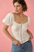 Ribbed Knit Hook-and-Eye Puff-Sleeve Peasant Top - ShopPromesa